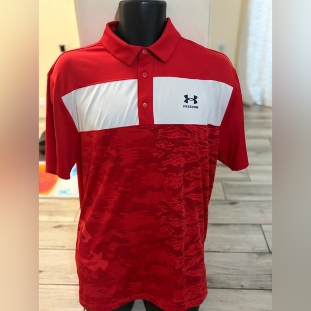 Men’s pre owned Under Armour size L large loose Freedom camo polo shirt .